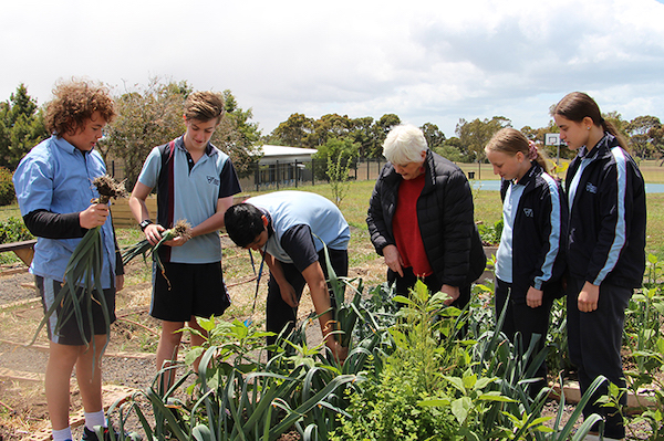 Stephanie Alexander and students in a garden Stephanie Alexander and students in a garden