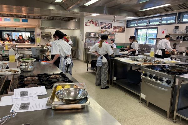Students in kitchen Students in kitchen