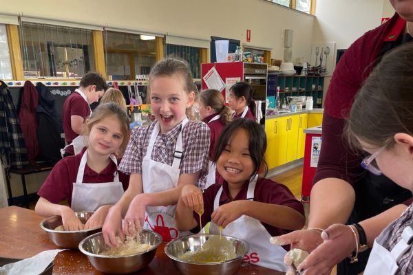 Kids making korokke