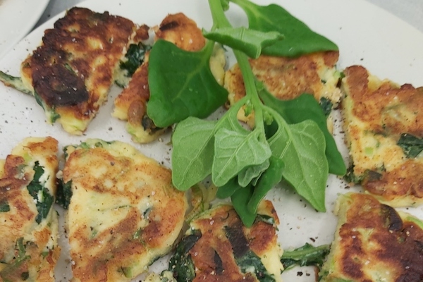 Fritters with green leaves on top